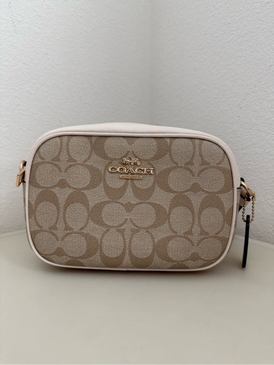 Coach Handbags - Coach Beige Signature Canvas Crossbody with white outline